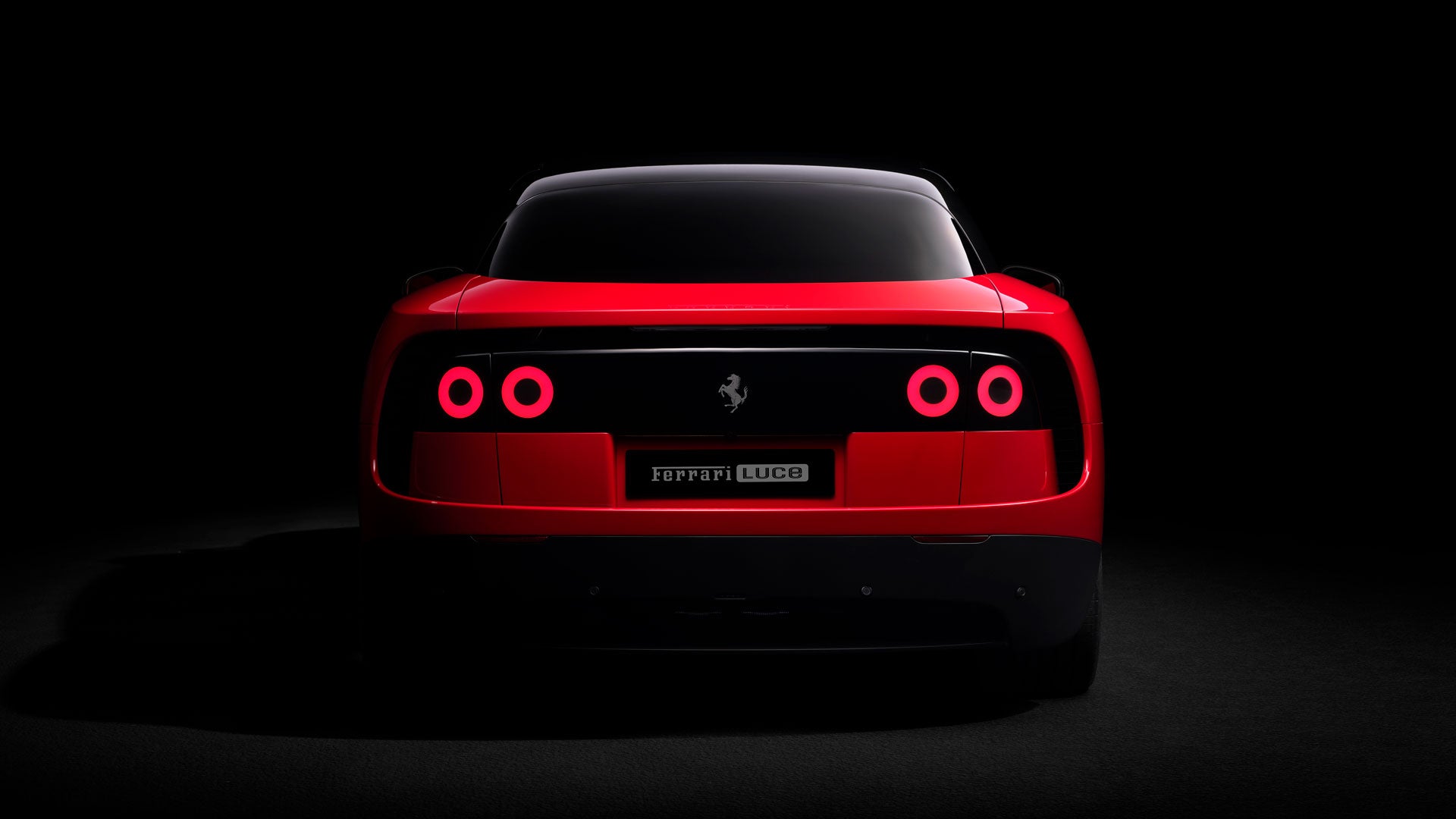 A red rotary knob with SPORT illuminated in orange, surrounded by DRY, WET, and ICE.